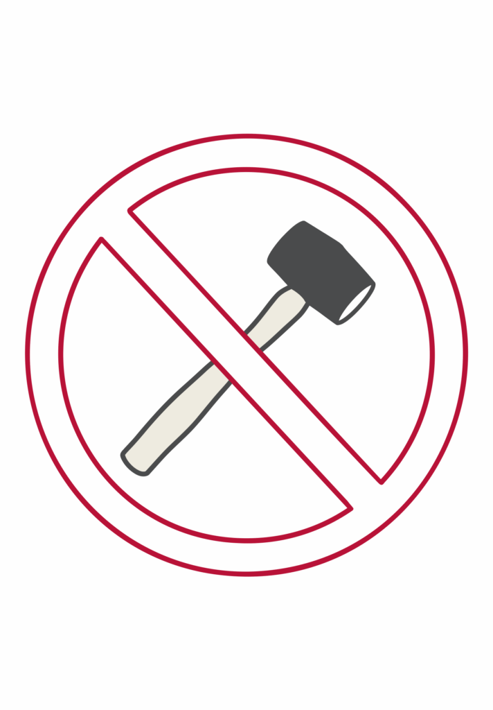 Rubber Mallet with a warning sign over it